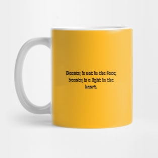 Beauty is not in the face; beauty is a light in the heart. Mug